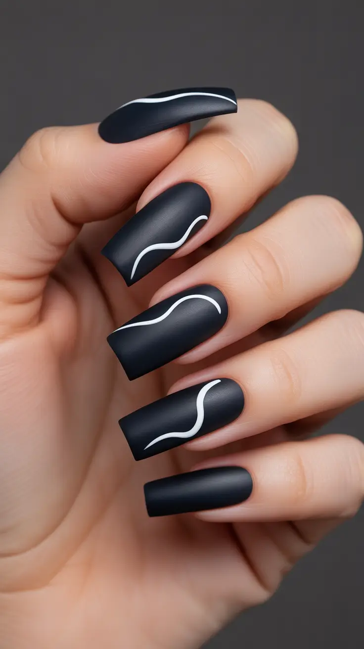 black-nail-designs-2026-Minimalist-Matte-with-White-Waves