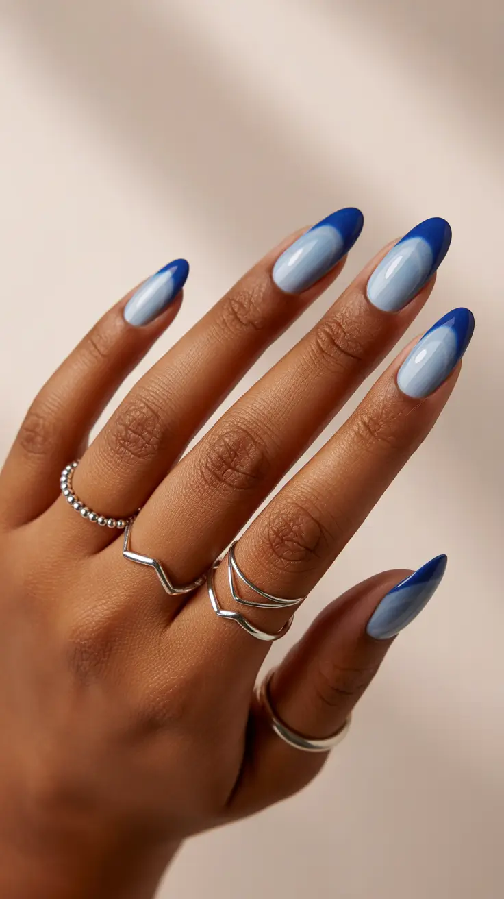 blue nail designs 2026 Midnight French: A Moody Twist on a Classic