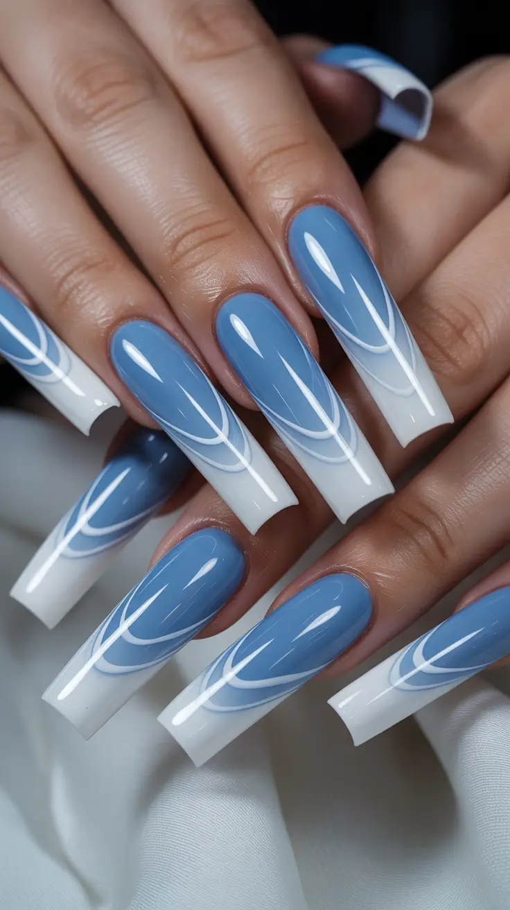 coffin nail designs 2026 Blue and White Coffin Nails With Curved Lines