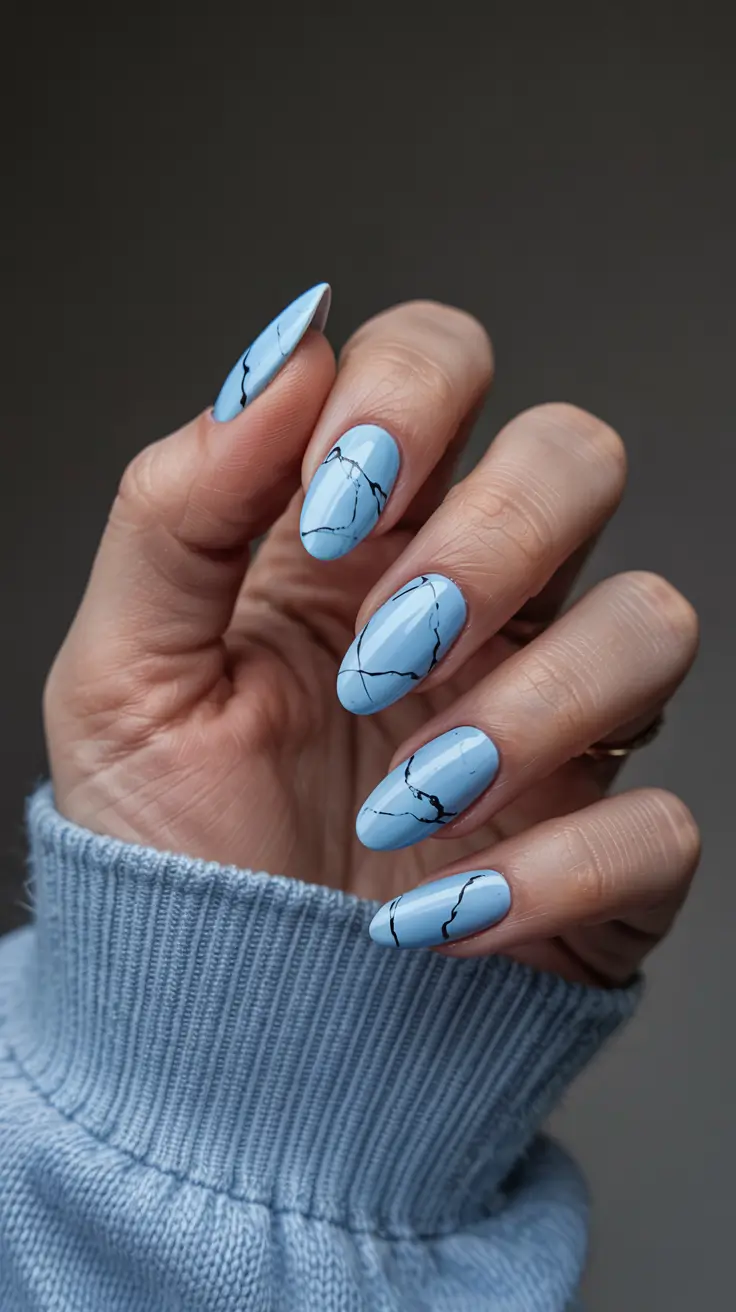 chic pretty spring nails design 2026 Sky blue marble with delicate veining