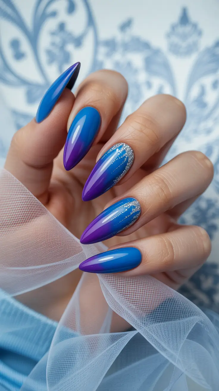 dreamy blue spring nails 2026 Electric Blue to Violet Ombre with Silver Stardust