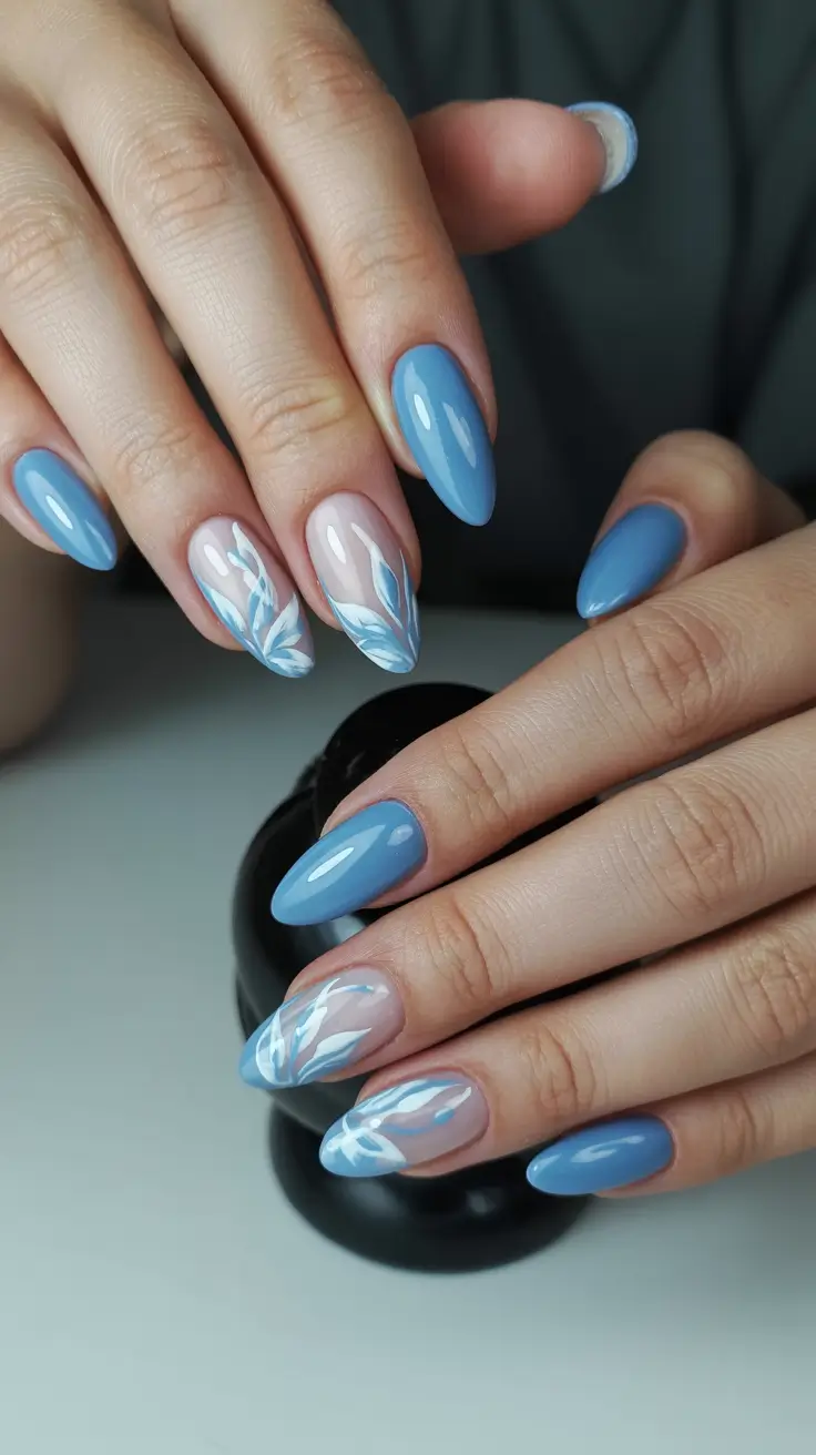 dreamy blue spring nails 2026 Glossy Sky Blue with Whispered Botanical Accents