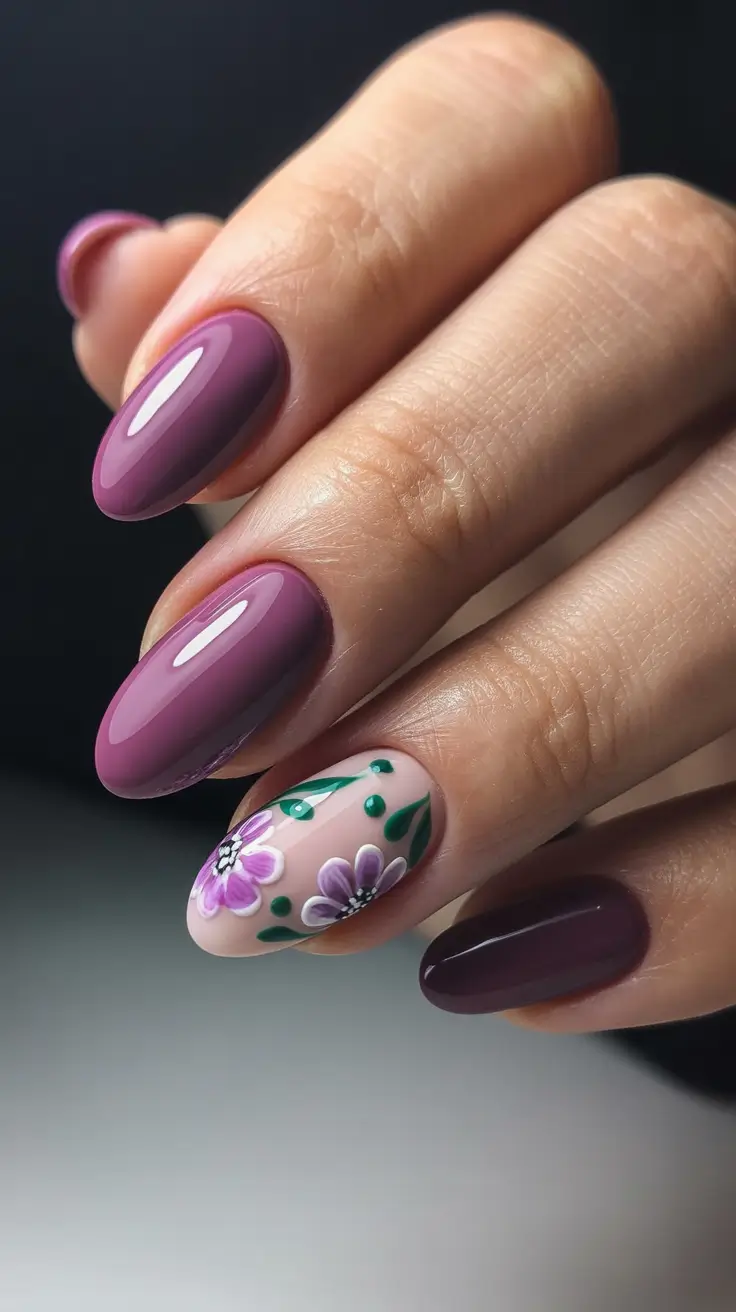pastel spring floral nails 2026 Plum Gloss With Delicate Floral Accent