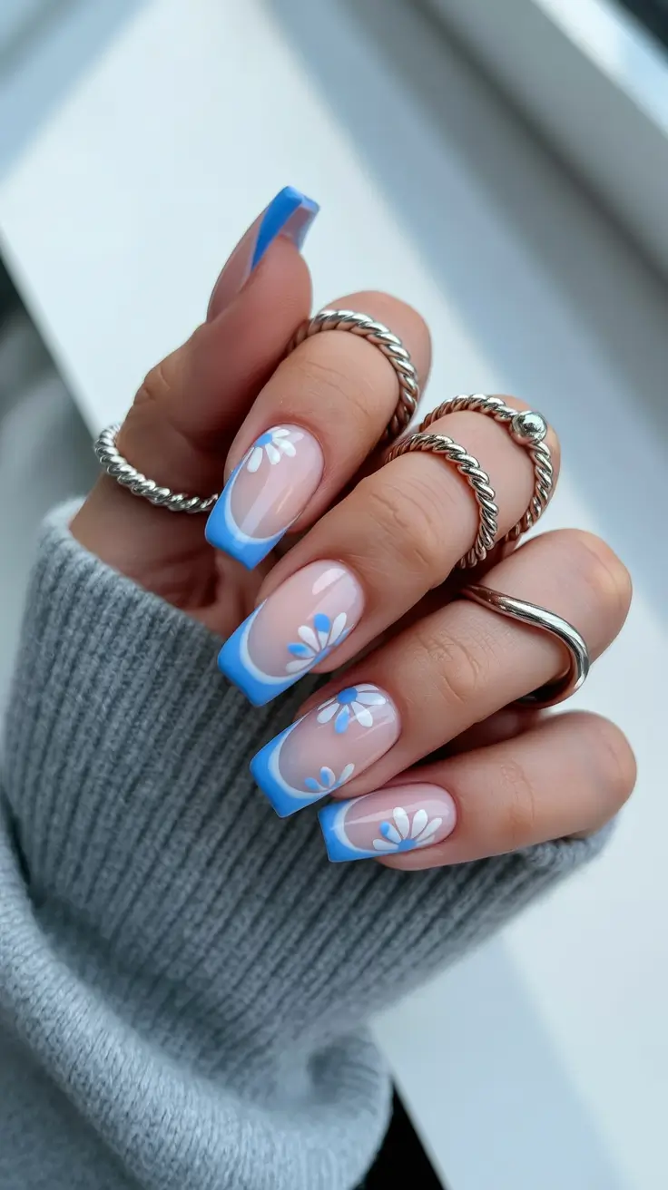 pastel spring floral nails 2026 Sky Blue French With Graphic Petals