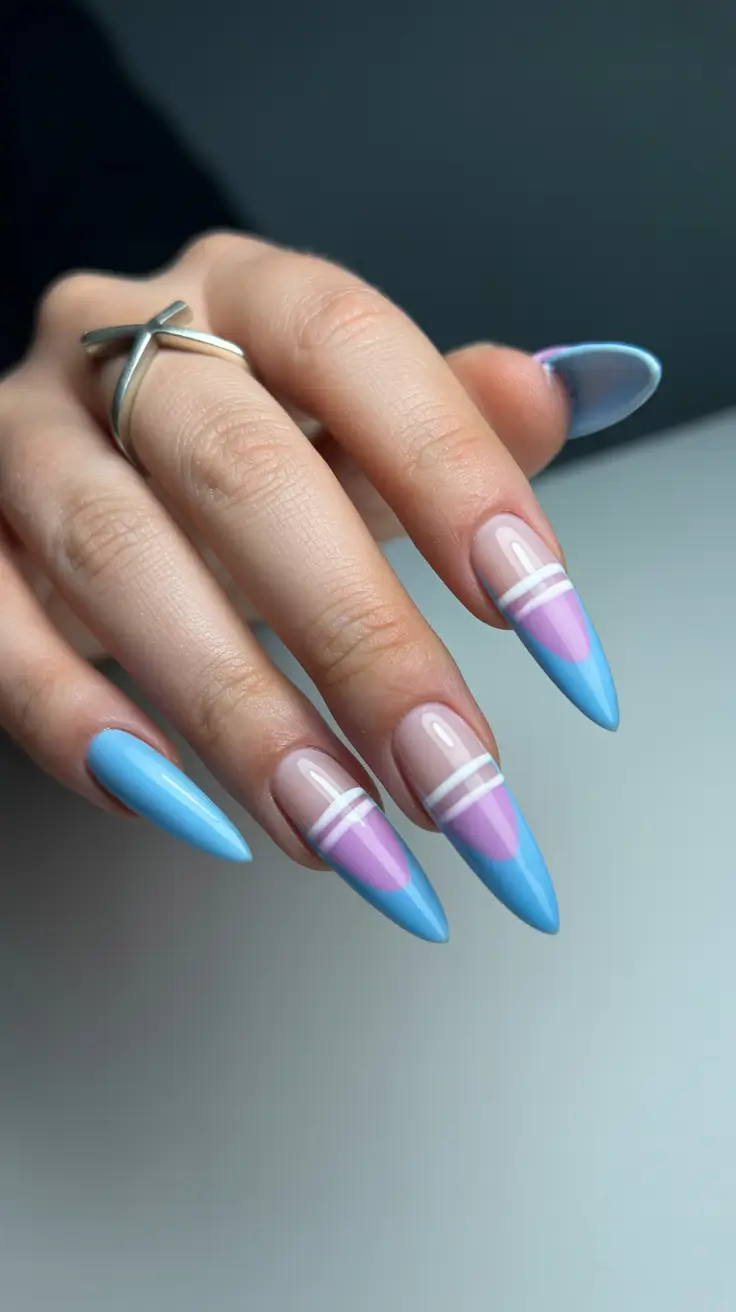 stylish early spring nails 2026 Pastel geometric stiletto fusion