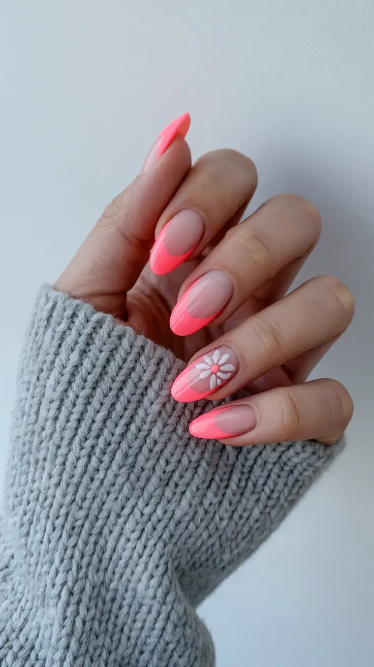 stylish spring break nails 2026 Neon Coral French with Minimal Daisy Accent