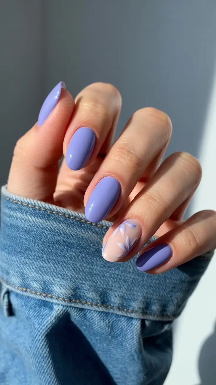 stylish spring oval nails 2026 Soft Periwinkle Oval with Minimal Botanical Accent