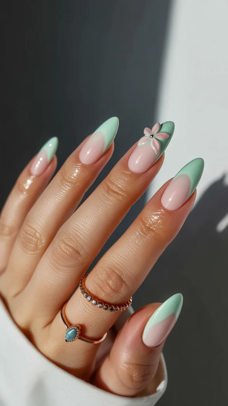 spring to summer season nails color ideas 2026 Mint French Almond Nails With Delicate Floral Detail
