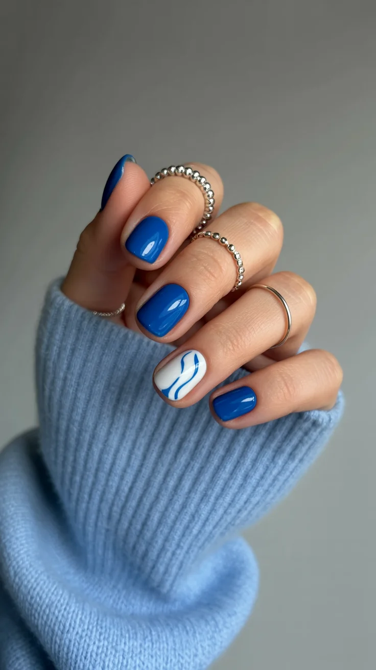 summer short nail inspo 2026 Deep Blue Gloss with Minimal Wave Accent