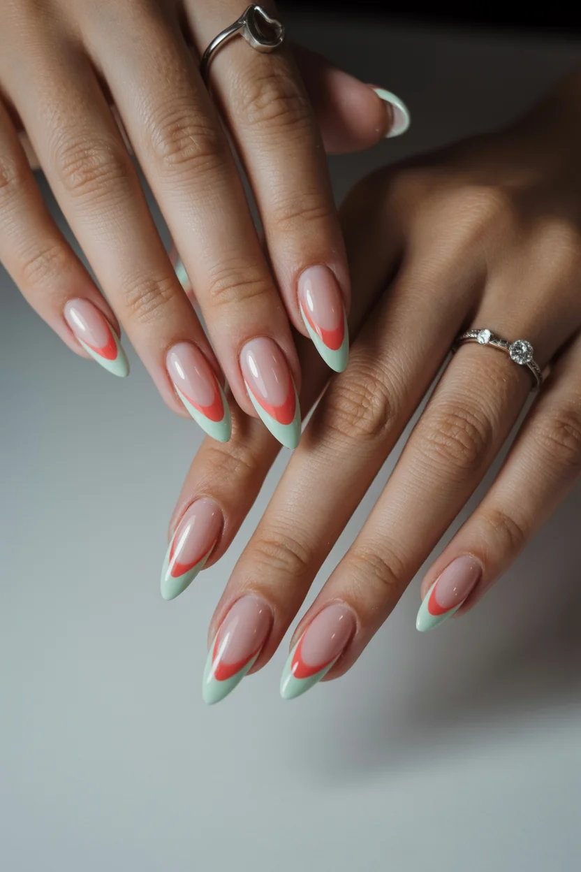 june nails ideas 2026 Mint and Coral French Designs Feel Surprisingly Elegant