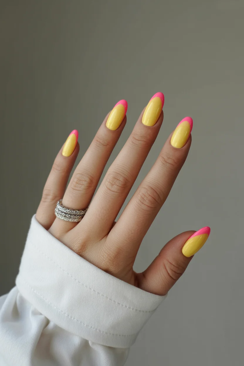 light summer nails 2026 Sunny Lemon French Tips With a Pop-Art Summer Twist