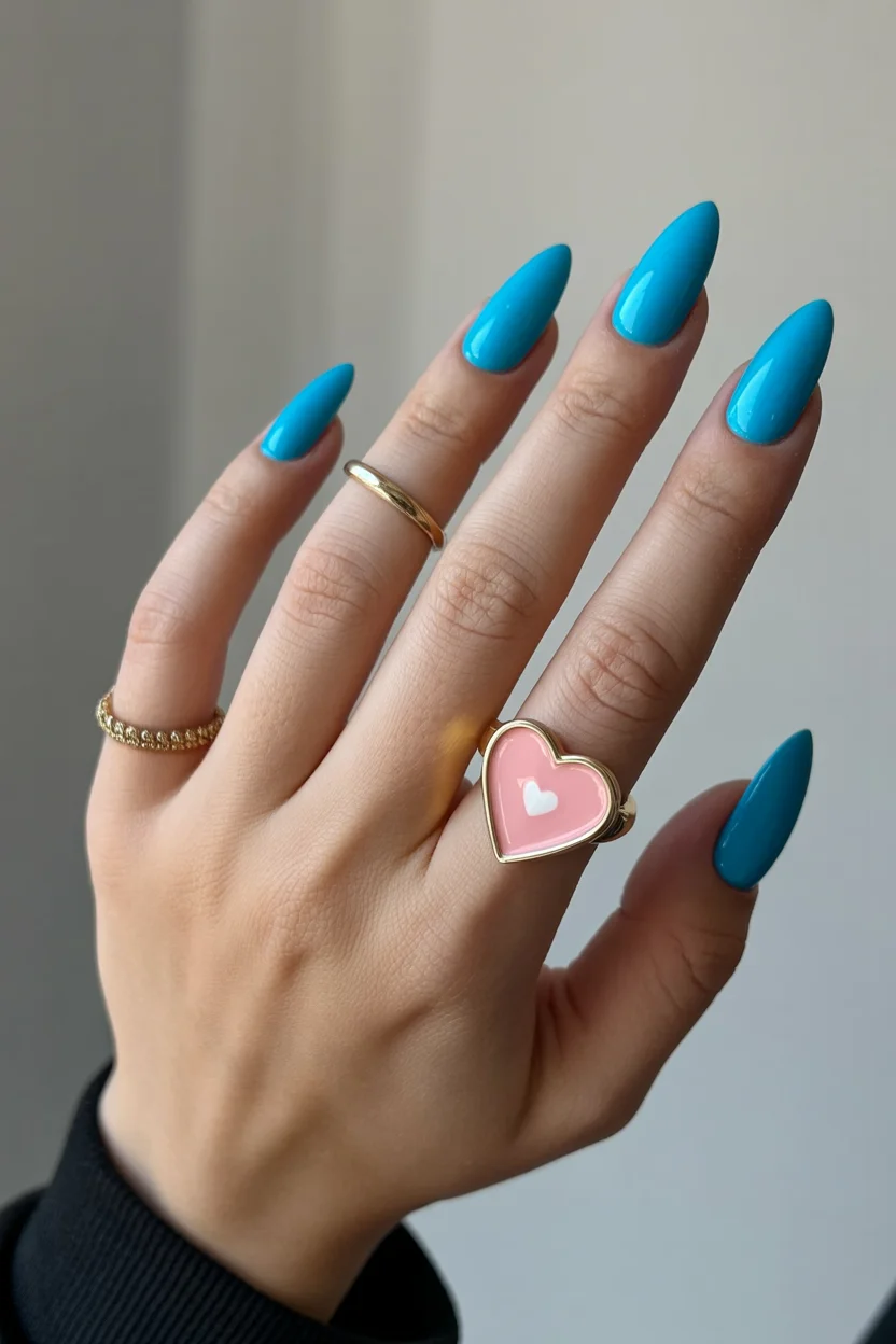 neon summer nails 2026 Glossy Turquoise Almond Nails for the Minimalist Who Still Wants Summer Energy