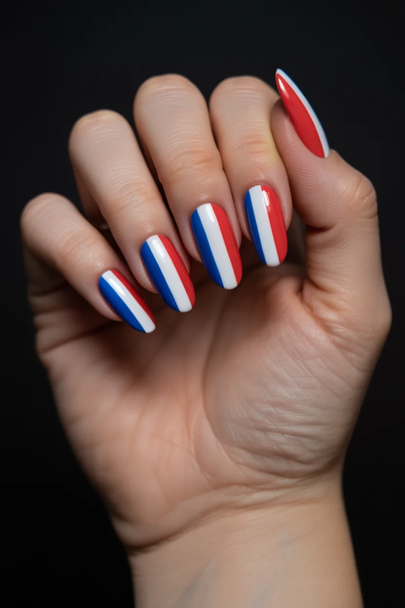 red white and blue nails 2026 Vertical Stripe Nails With a Runway Inspired Finish