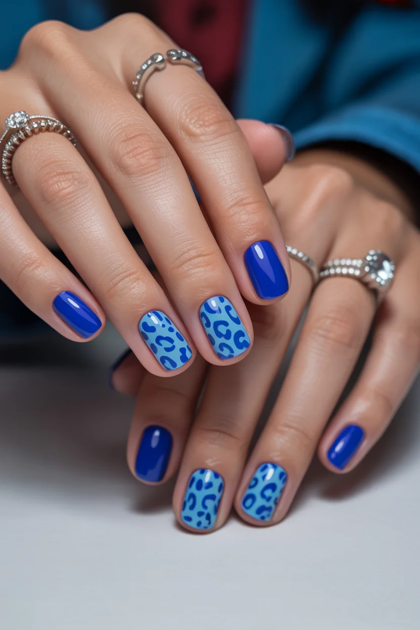short gel nails summer 2026 Electric Blue Leopard Nails That Make Minimal Length Feel Bold