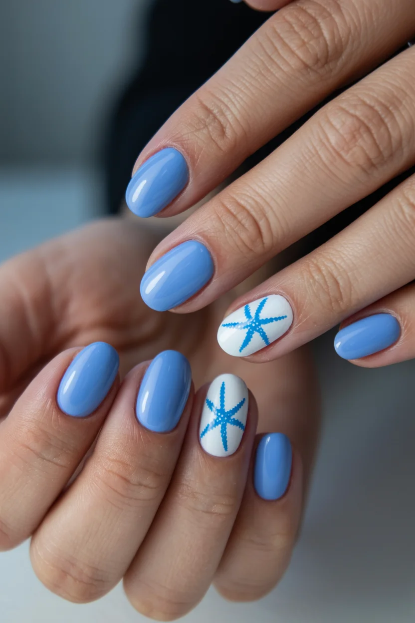 summer beach nails 2026 Soft Blue Coastal Nails With Delicate Starfish Accents