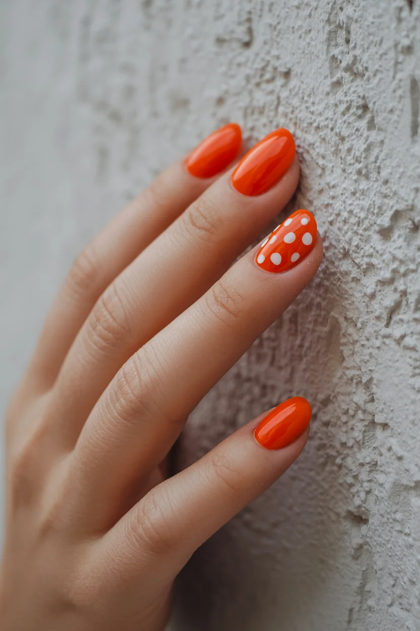 summer gel nails 2026 Orange Polka Dot Nails Bring Back Retro Summer Energy