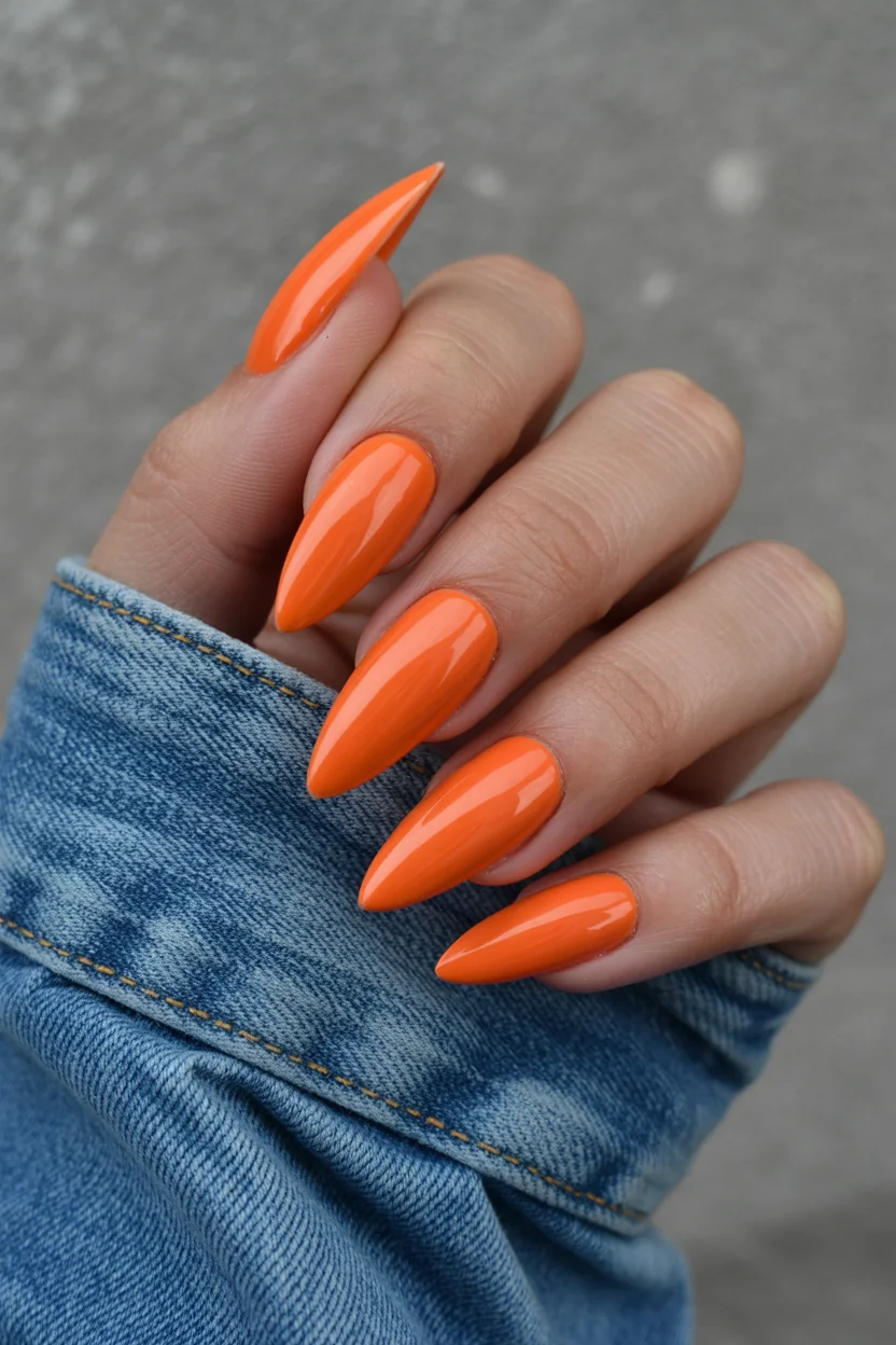 summer manicure color ideas 2026 Hot Tangerine Stiletto Nails for the Bold Summer Mood