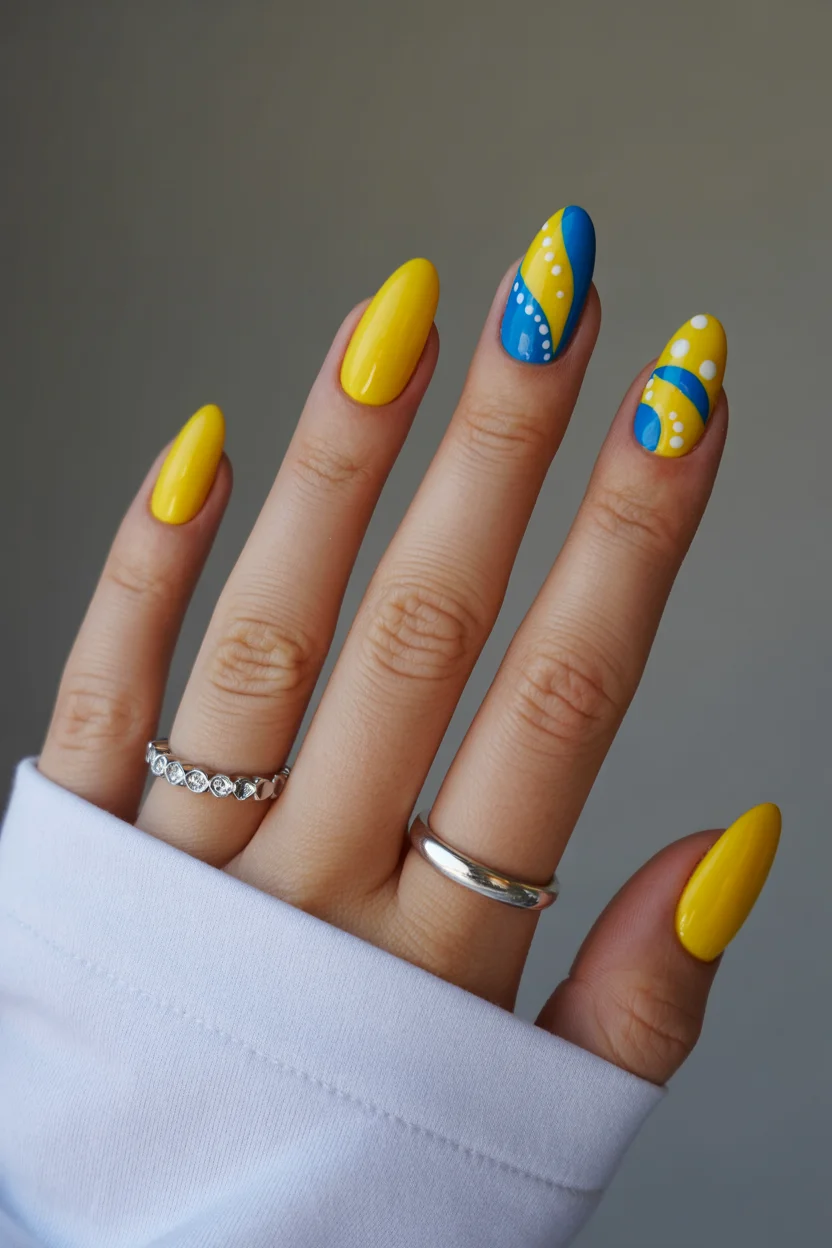 summer nail colors 2026 Electric Yellow and Blue Swirls for a Dopamine Summer