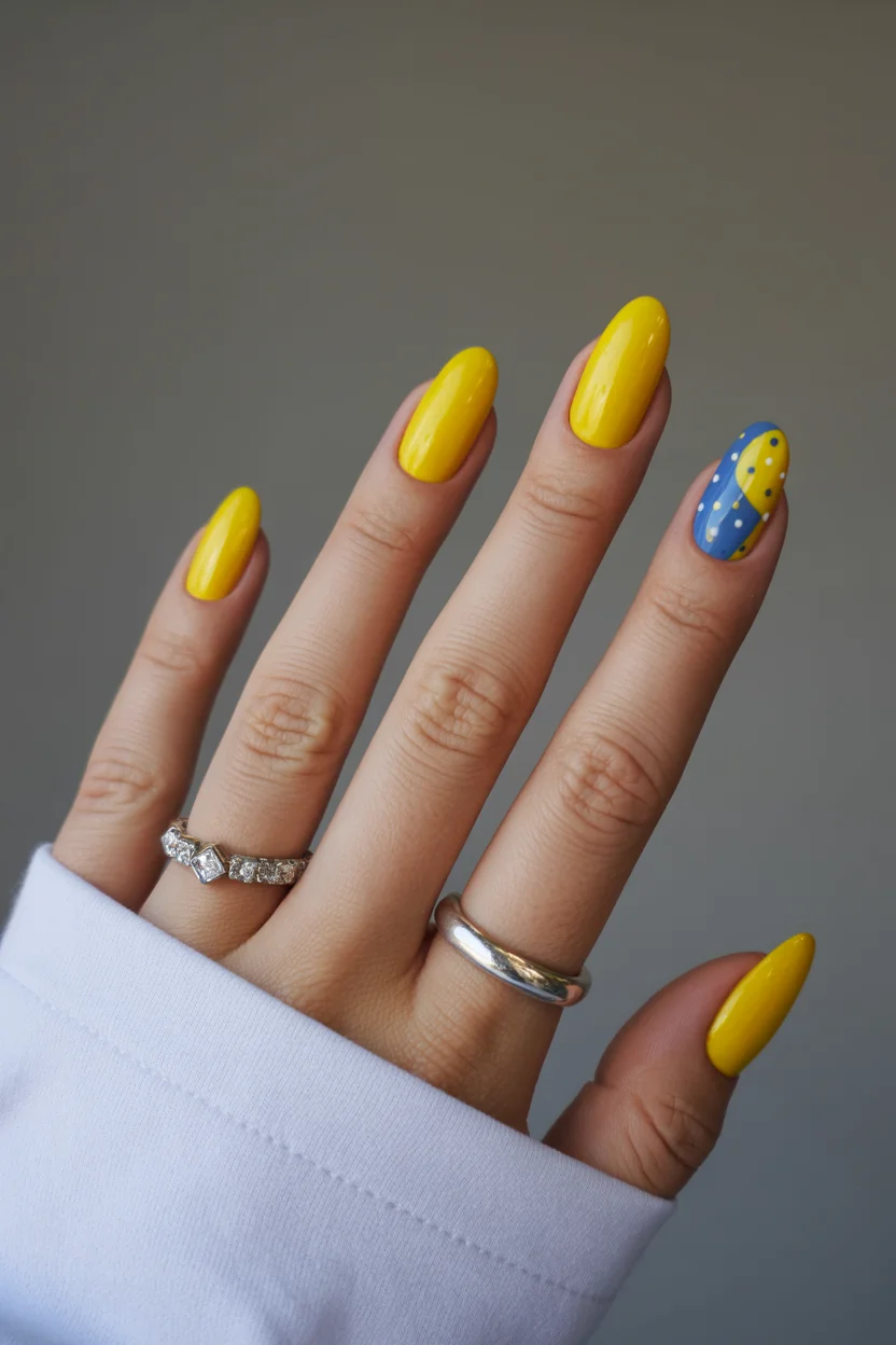 summer nail inspo 2026 Sunbeam Yellow Nails With Playful Blue Accent Art