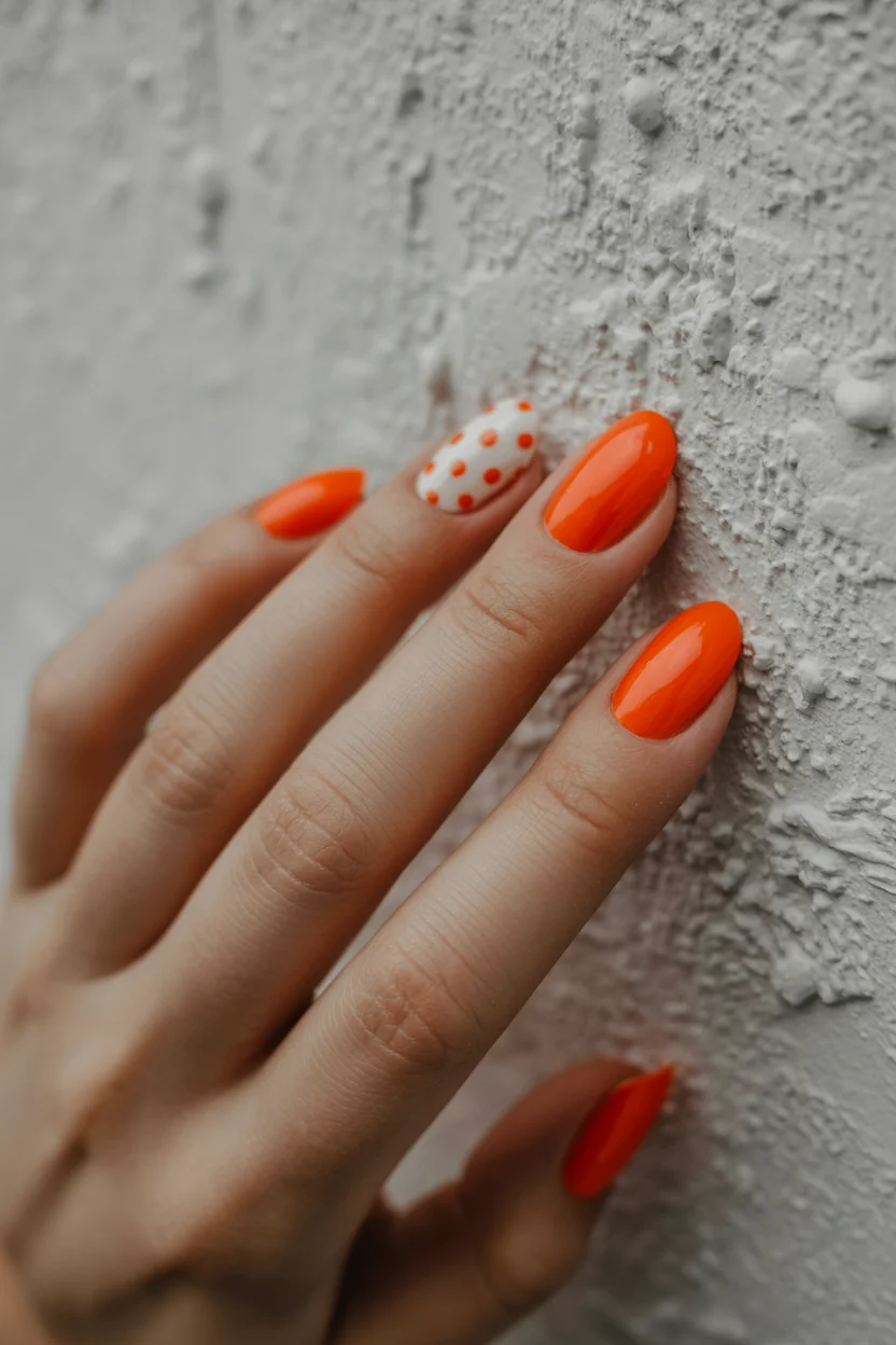 Summer nail art ideas 2026 Glossy Orange Polka Dot Nails