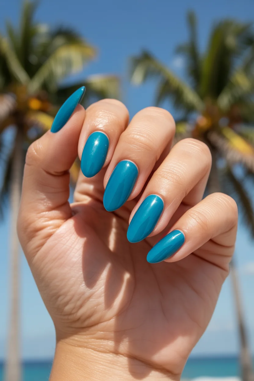 bright summer nails 2026 Tropical Lagoon Blue for an Effortlessly Polished Summer Look