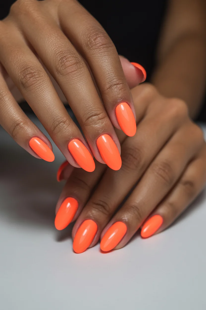 bright summer nails 2026 Neon Tangerine Gloss for Endless Summer Vibes