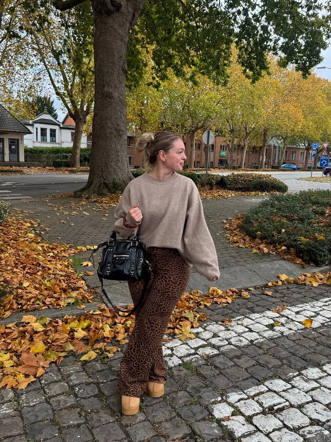 comfy fall outfits 2026 Neutral Knitwear Meets a Bold Leopard Statement