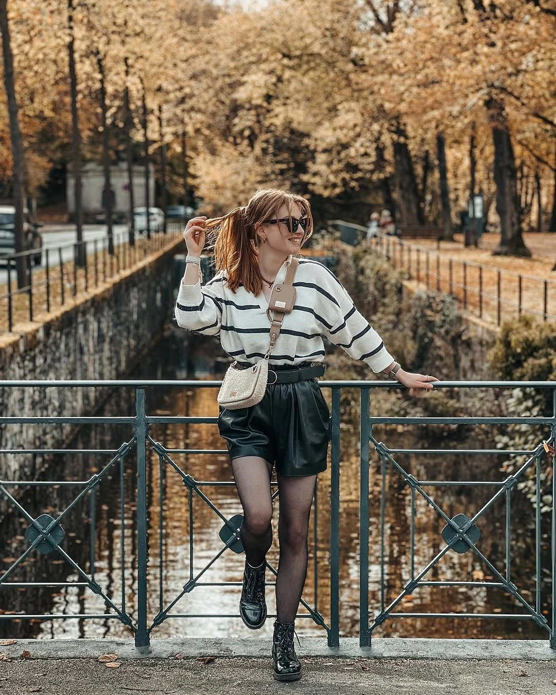comfy fall outfits 2026 Striped Knit With Leather Shorts for Mild Autumn Days