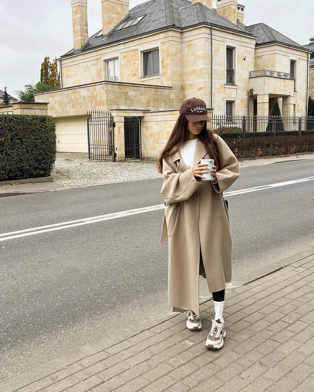 cozy & chic autumn outfits for women 2026 Minimal Camel Coats for Relaxed City Days
