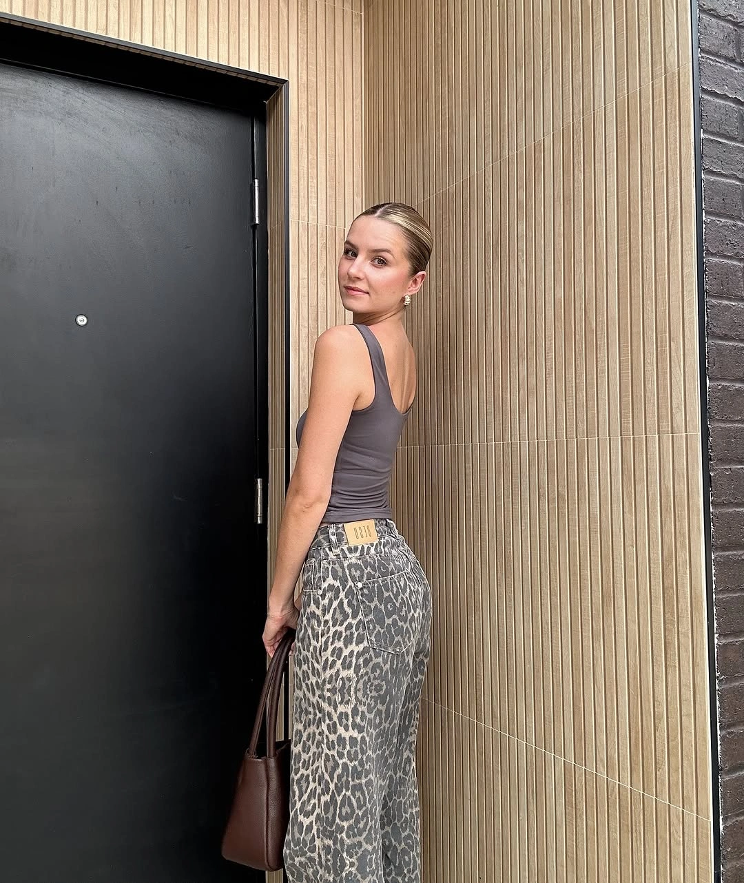 early fall outfits 2026 Leopard Wide-Leg Jeans with a Minimal Tank for Modern Contrast