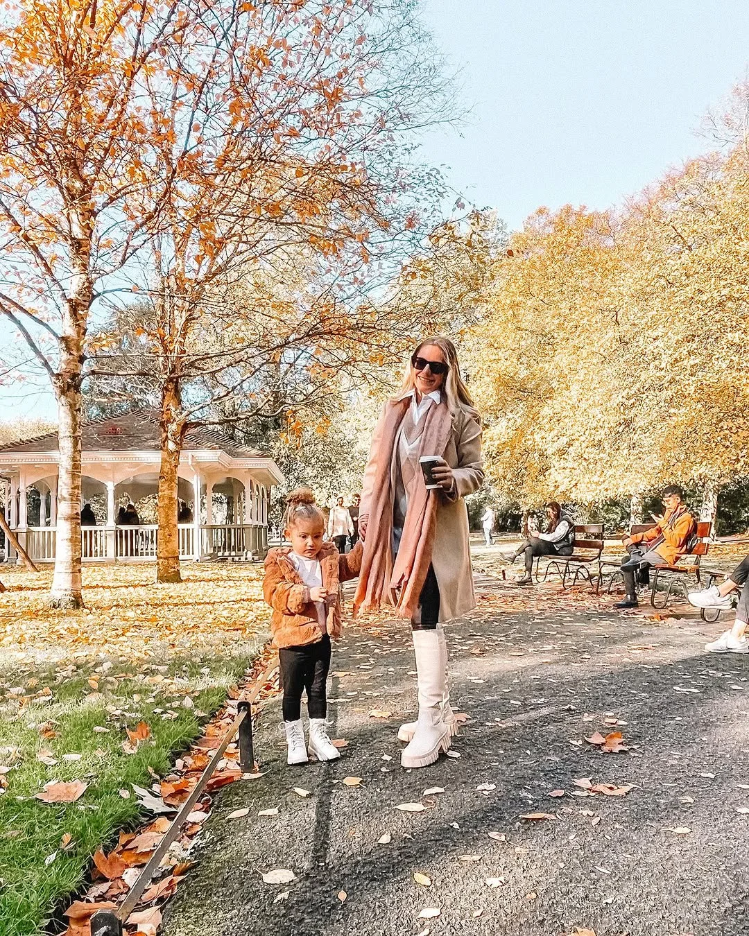 fall family picture outfits 2026 Soft Camel Coats and Cream Boots for an Elevated Mother Daughter Style