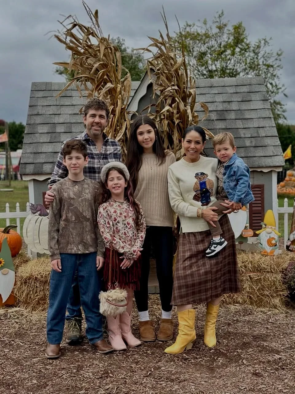 fall family picture outfits 2026 Earthy Plaids and Pumpkin Patch Layers That Feel Effortless