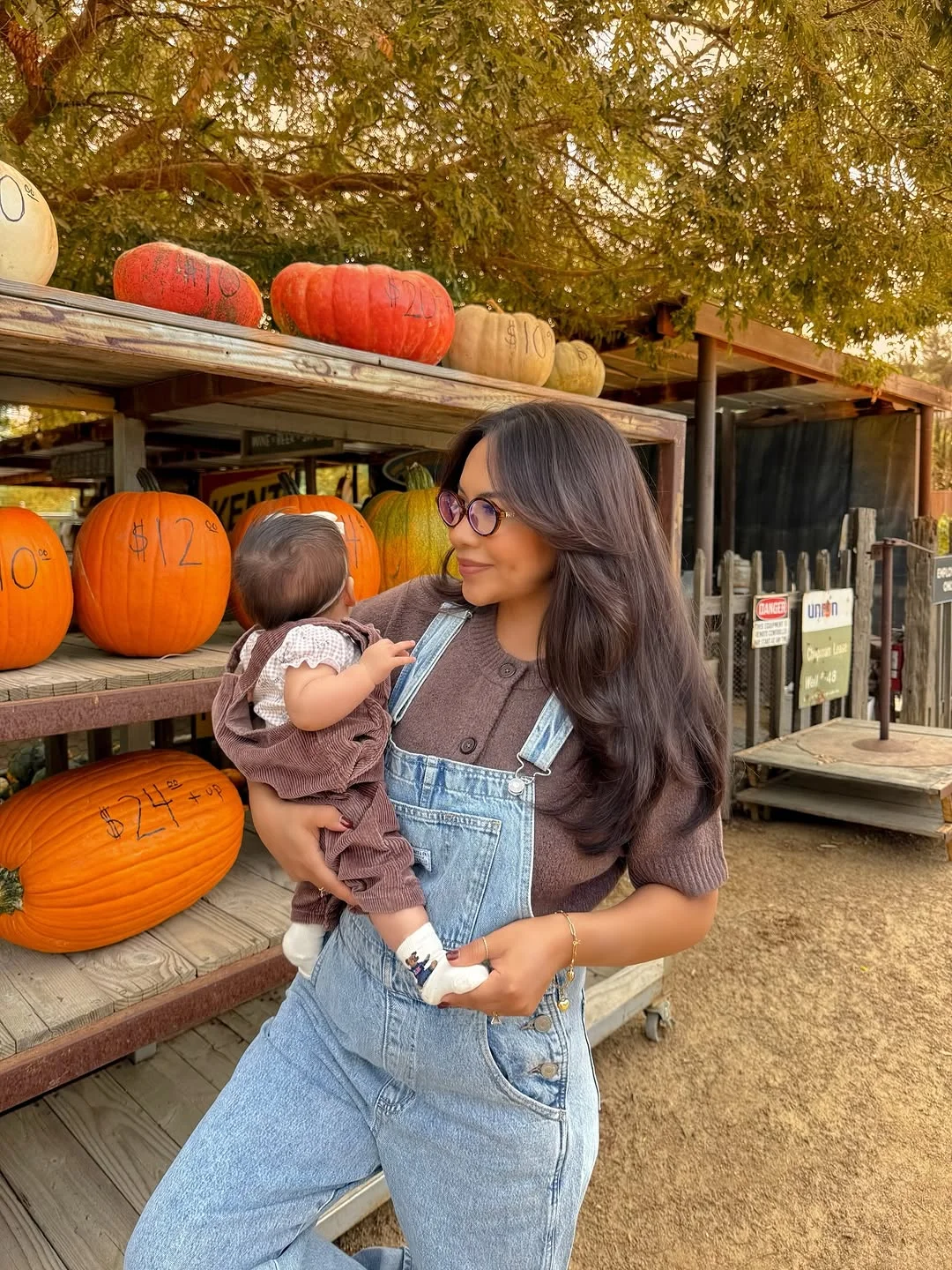 fall family picture outfits 2026 Denim Overalls Meet Cozy Neutrals for a Modern Pumpkin Season Look
