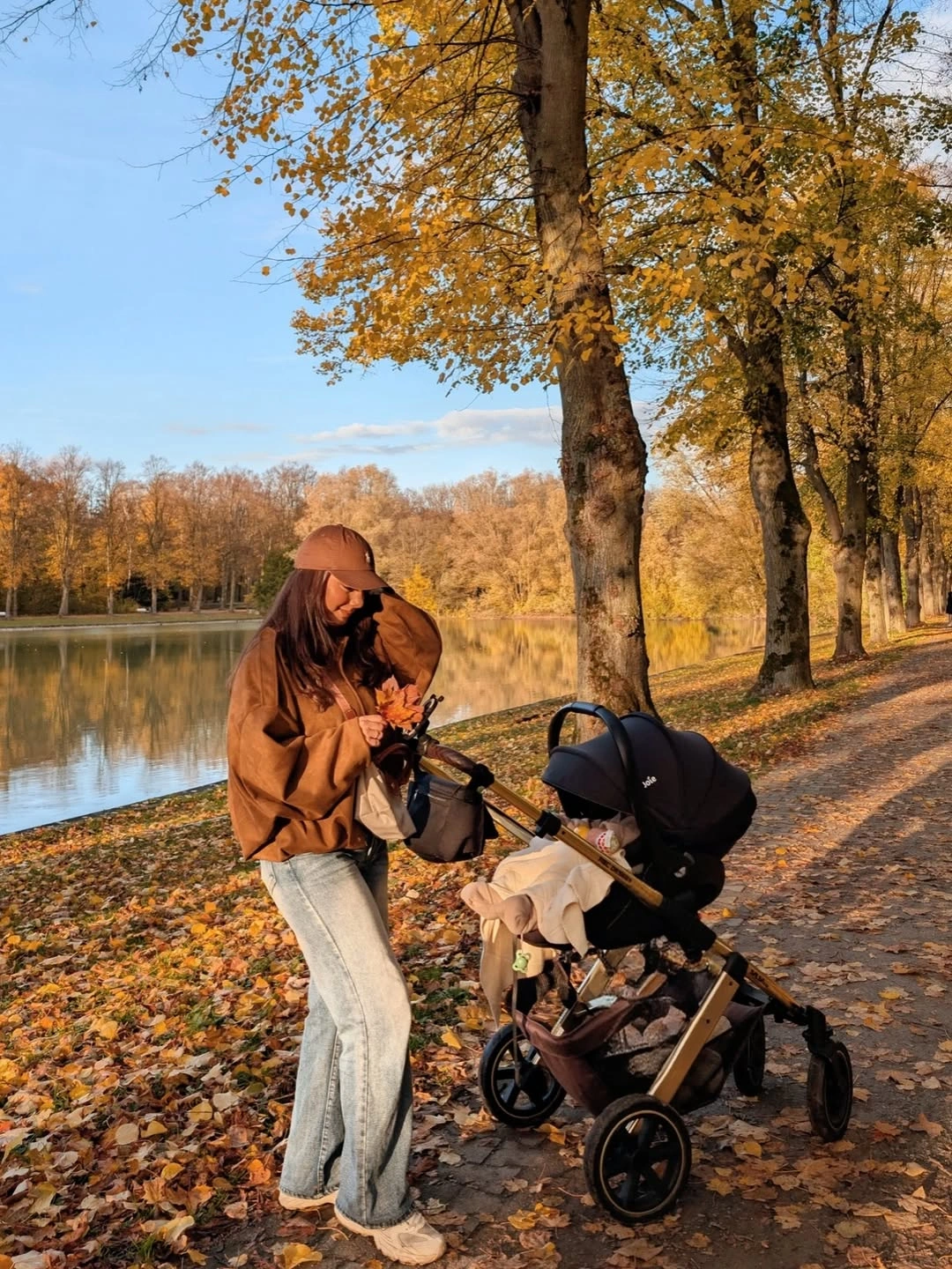 fall mom outfits 2026 Warm Brown Layers Perfect for Peaceful Walks With the Stroller
