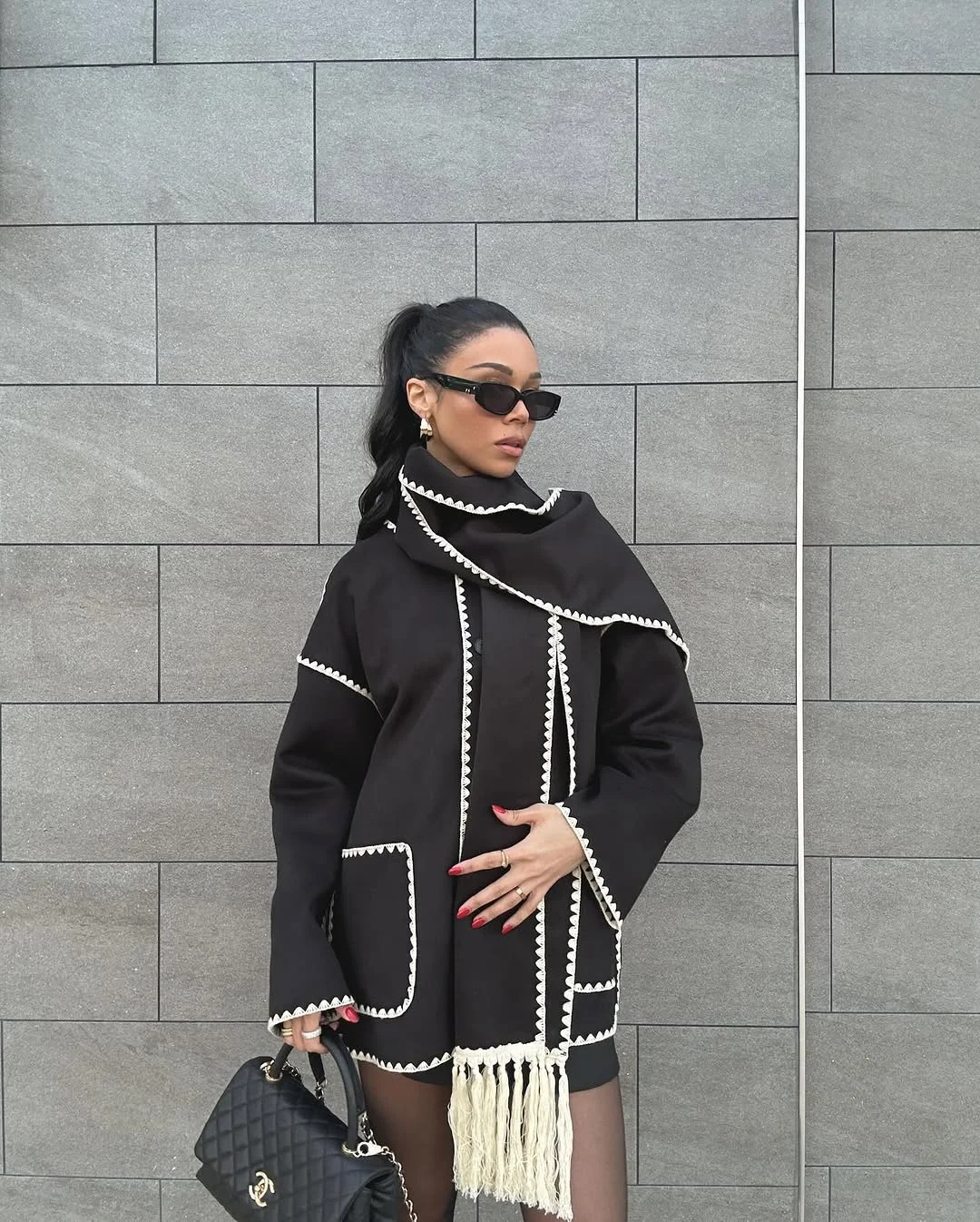 fall outfits with coat 2026 Statement Black Coat With A Modern Scarf Detail