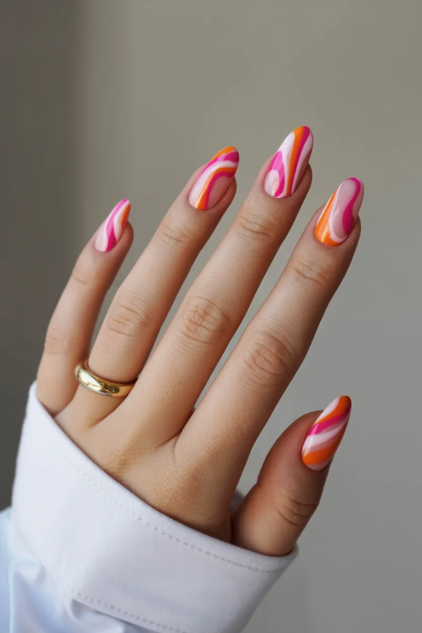 funky summer nails 2026 Pink and Orange Swirl Nails With Retro Sunset Energy