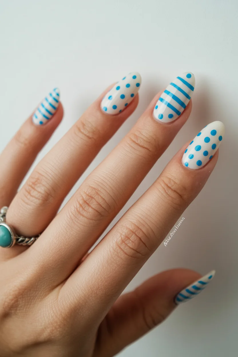 light summer nails 2026 Blue and White Coastal Patterns Inspired by Summer Escapes