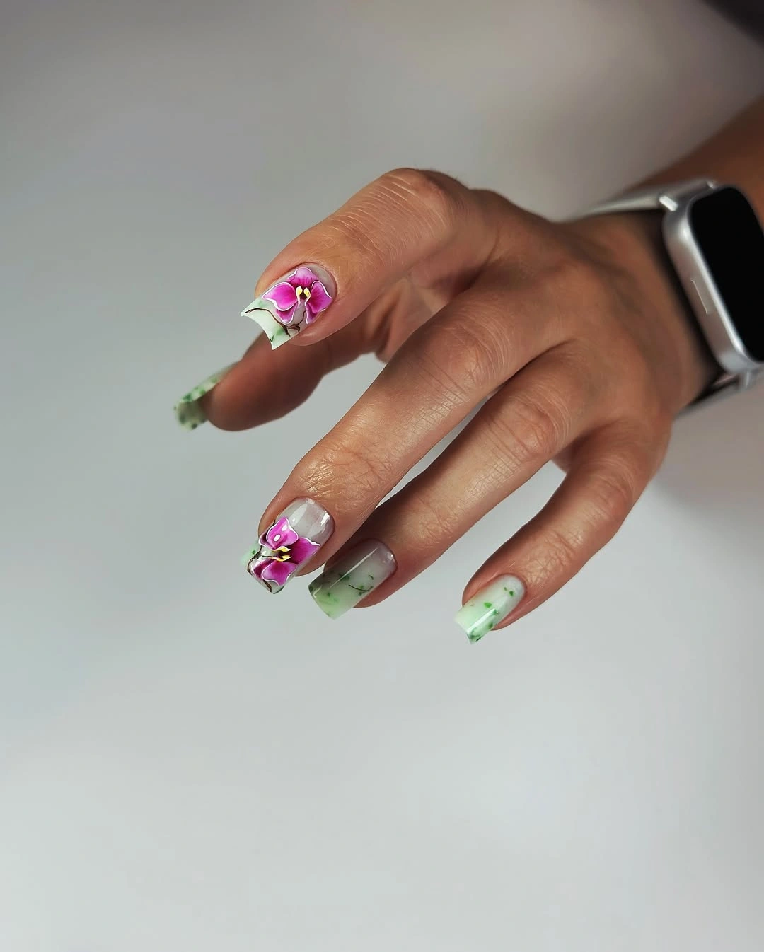 august nails color 2026 Soft Botanical Blooms with Fresh Green Accents