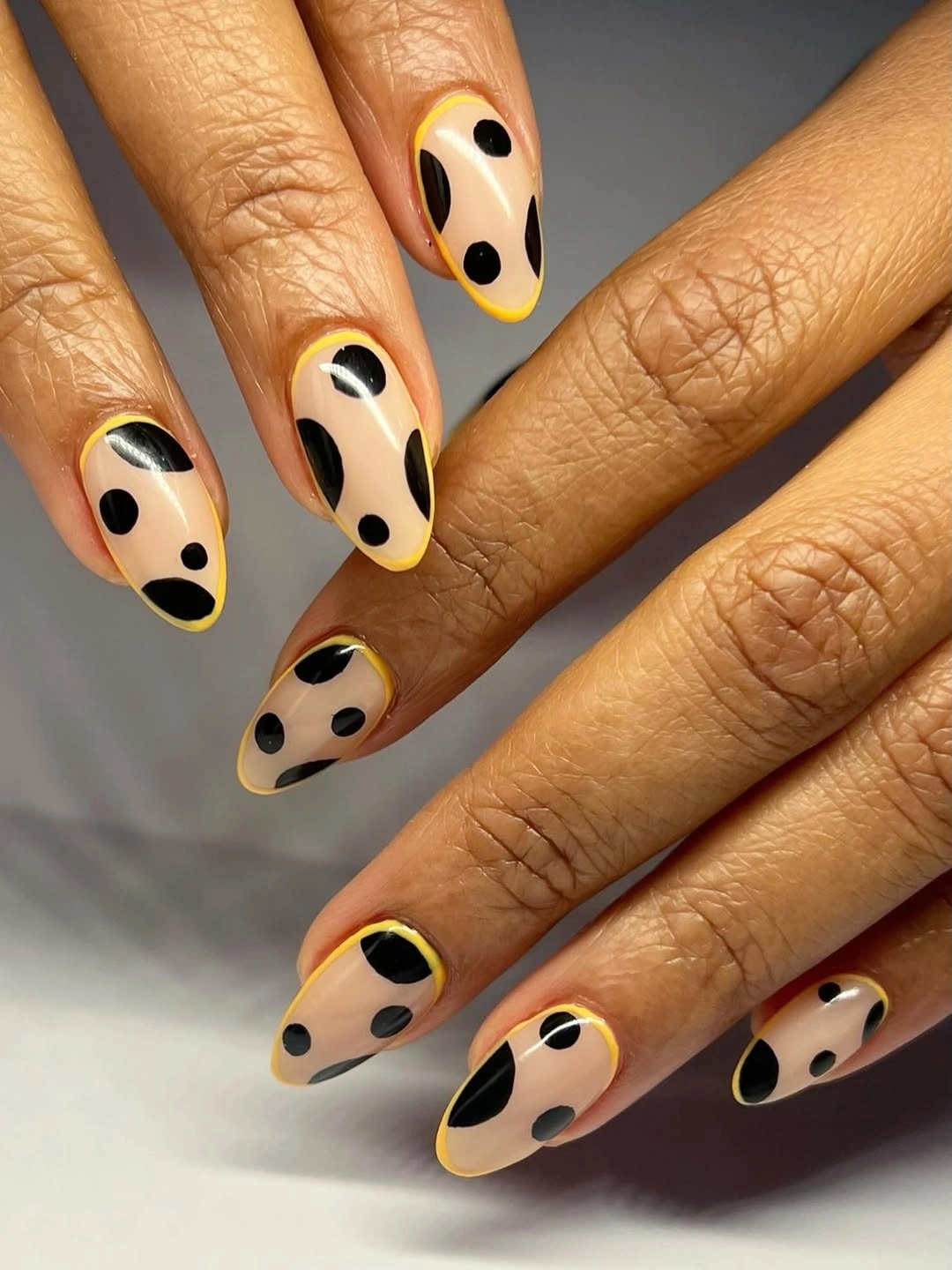 august nails color 2026 Modern Neutral Nails with Graphic Black Spots