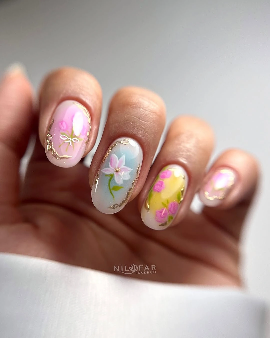 august nails color 2026 Delicate Pastel Garden Nails with Golden Details