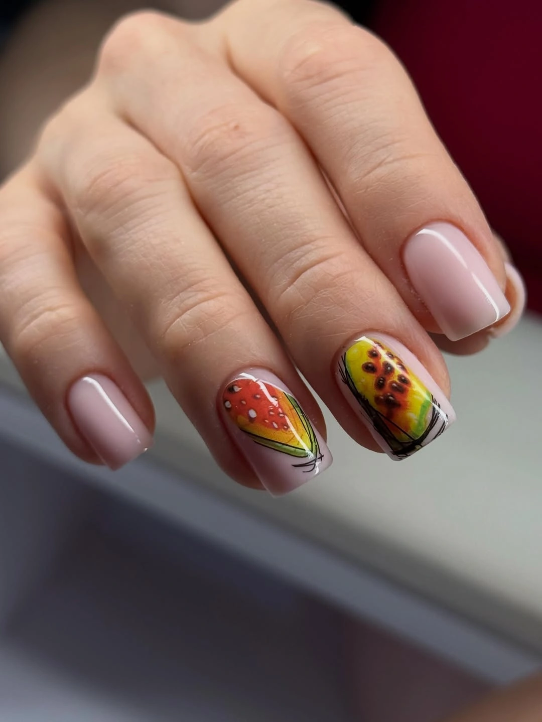 august nails ideas 2026 Fresh Papaya Art on a Soft Neutral Base