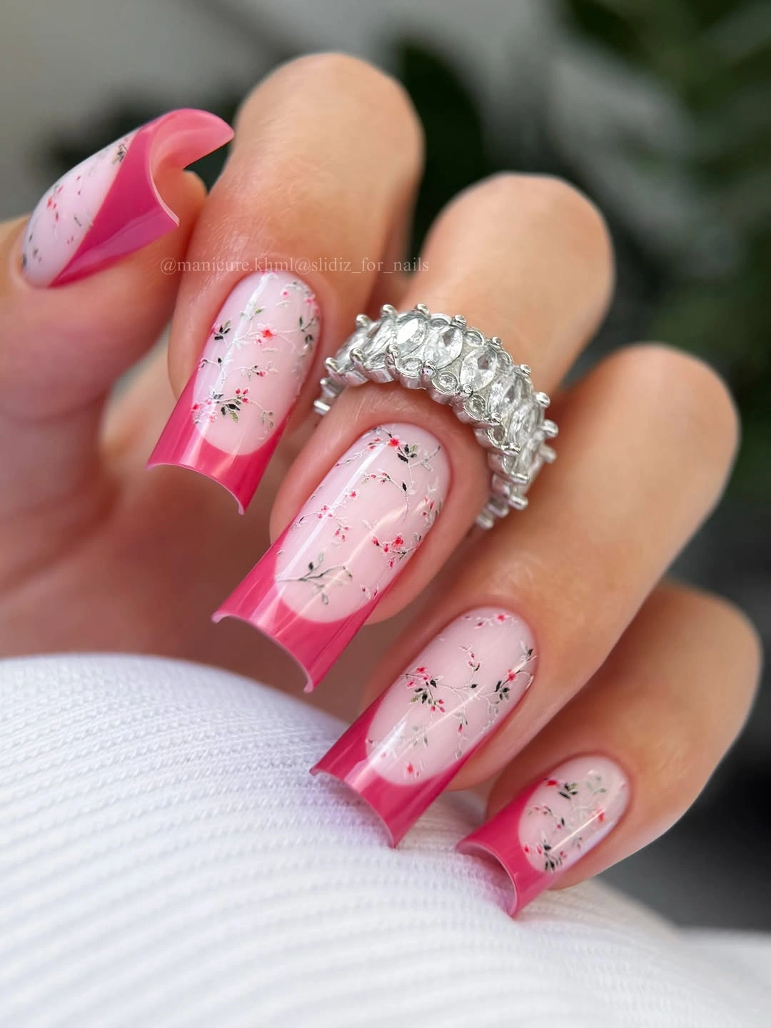 august nails ideas 2026 Hot Pink Floral French Tips With a Romantic Twist