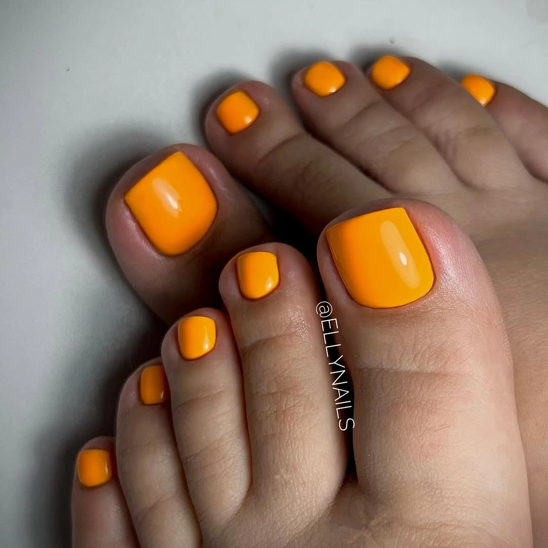 august pedicure nails ideas 2026 Sunny Mango Orange That Extends Summer