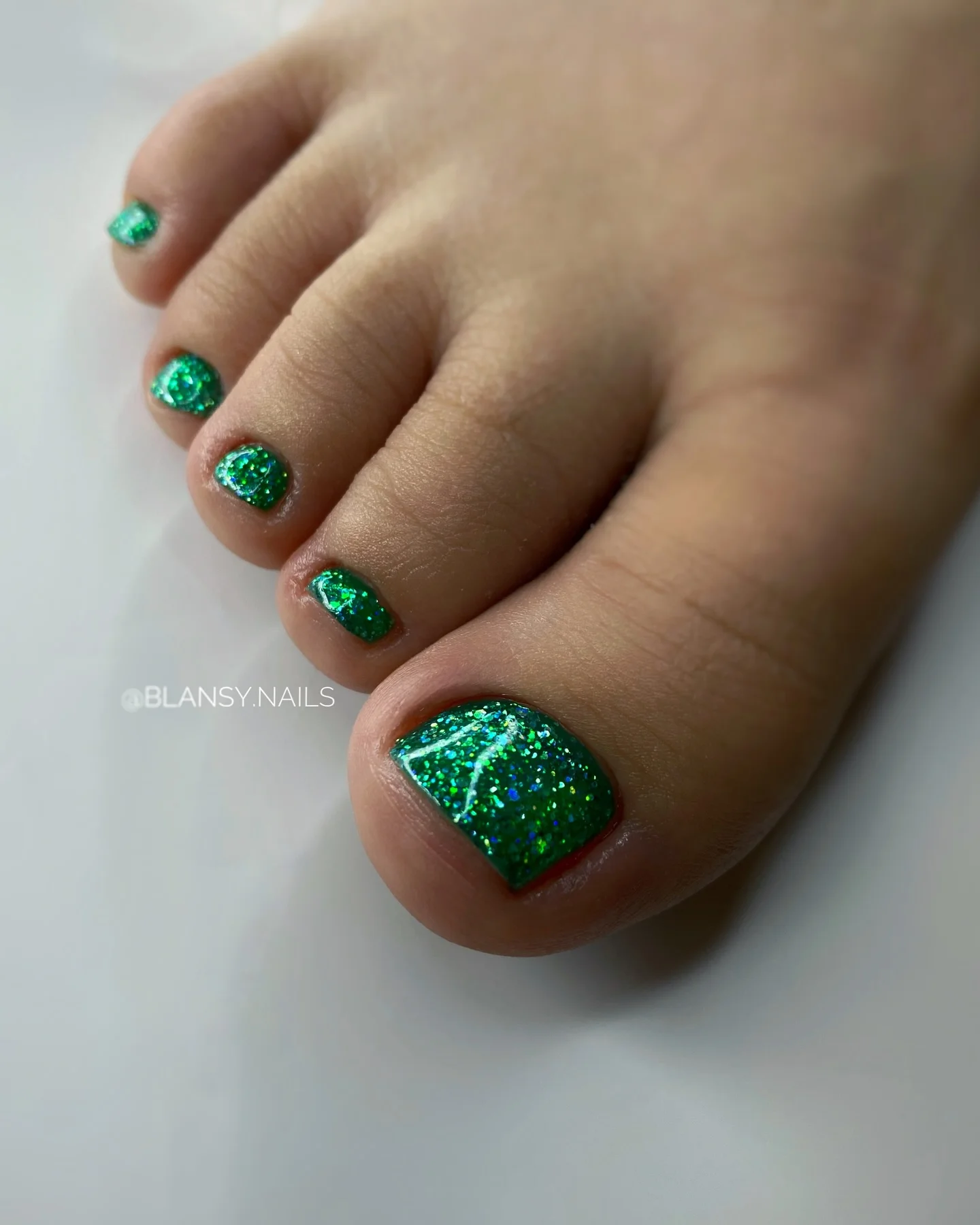 august pedicure nails ideas 2026 Emerald Glitter That Catches Every Ray of August Sunshine