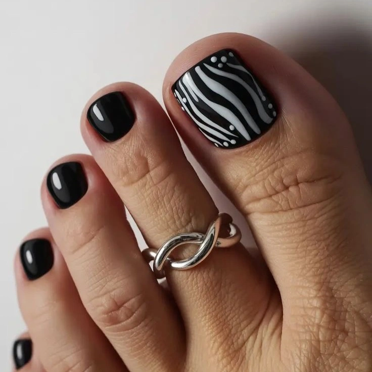 august toe nails 2026 Graphic Zebra Accents That Make Black Polish Feel Fresh