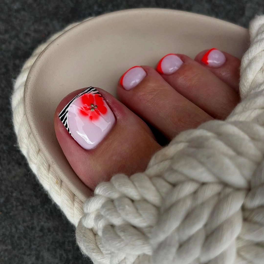 august toe nails 2026 Neon Floral French Tips with a Modern Twist