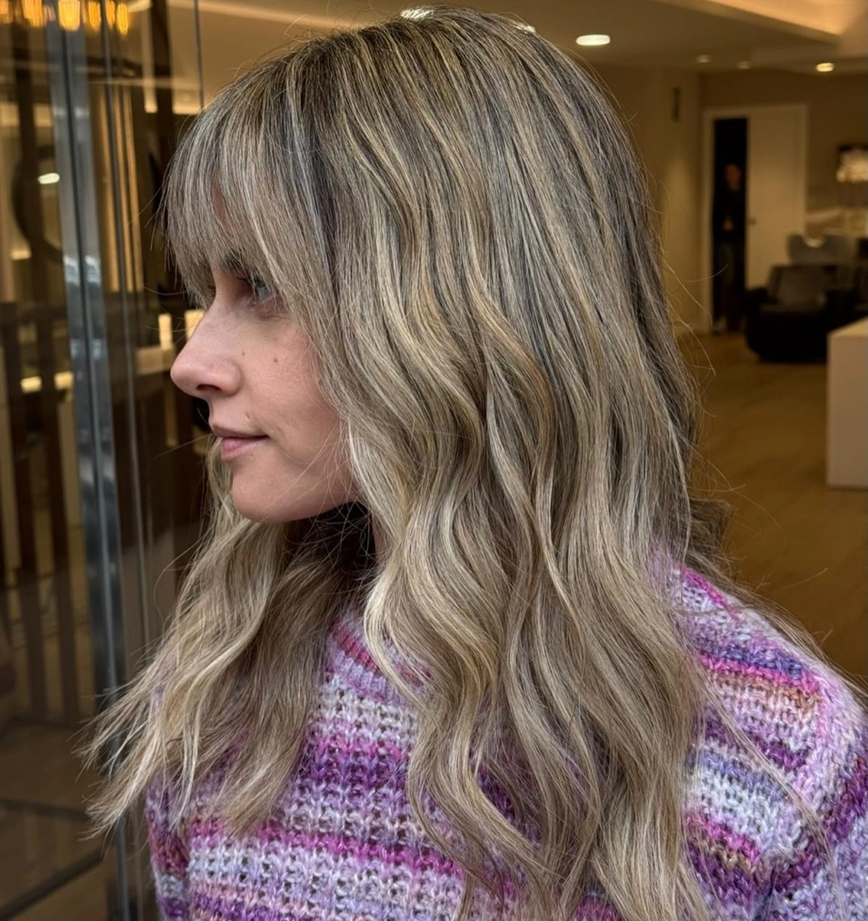 babylights hair ideas Soft Sandy Babylights with Wispy Curtain Bangs