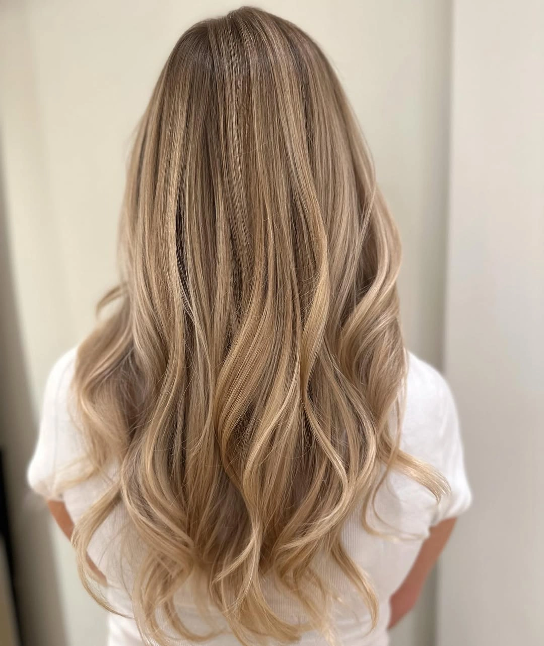 beige blond hair color Warm Beige Blonde with Glossy Ribbon Highlights