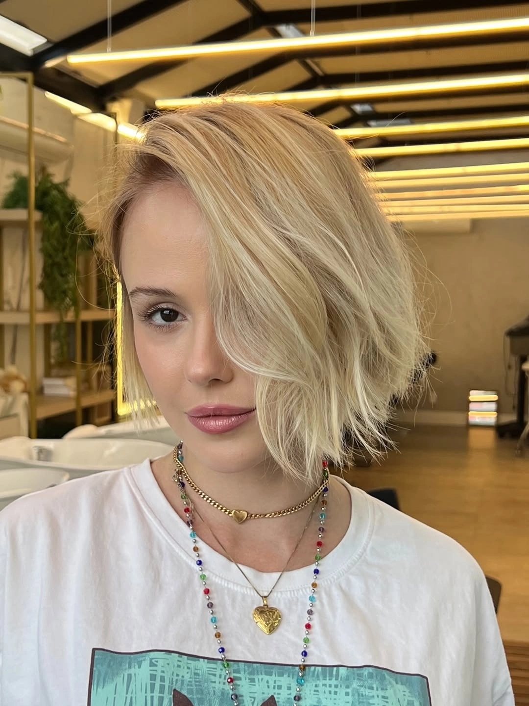 bobbed haircut for women Soft Blonde Bob With Effortless Side Movement