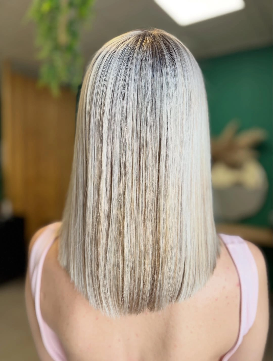bobbed haircut for women Ice Blonde Blunt Bob With Mirror Shine